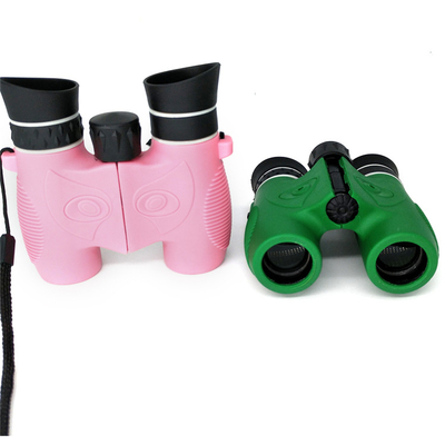 Jumelles optiques d'enfants du prisme Bak4, les jumelles roses des enfants 6x21 antichoc